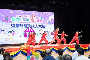 Residents enjoy sport-themed stage performances. 1